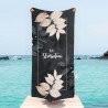 Customizable beach towel "Flamingo with name"