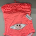 Costume premaman con bimbo che esce dalla zip